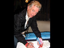 christopher mcdonald signing wizard jeans for charity.jpg